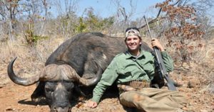 Donald Trump Jr. with a dead buffalo in Zimbabwe